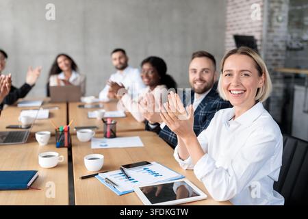Successful Business People Applauding Celebrating Success In Modern Office Stock Photo