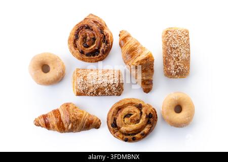 Assorted pastries and donuts isolated on white background Stock Photo