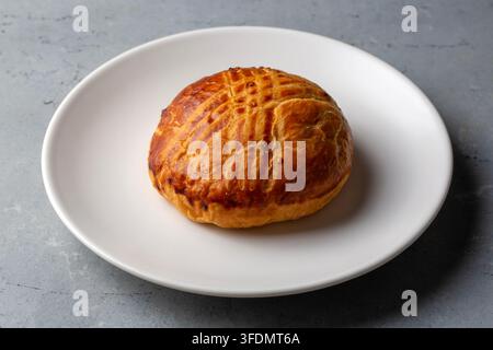 Pogaca isolated on white background. Turkish pastry product Stock Photo
