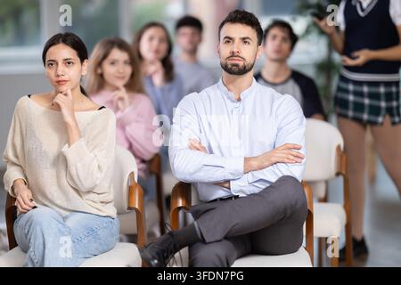 Students sit attentively in the classroom and listen to lectures Stock Photo