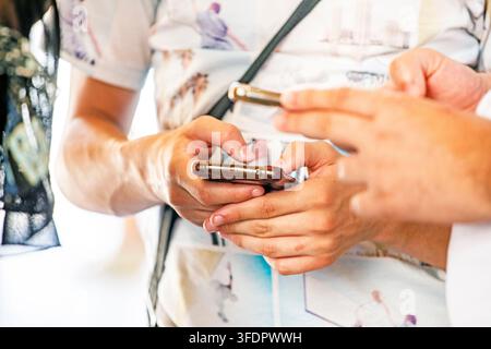 Exchange information between phones. Technologies and capabilities Stock Photo