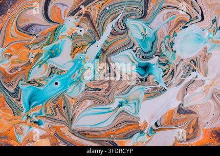 Vibrant abstract acrylic fluid pour texture featuring bright turquoise, orange, and white swirls Stock Photo