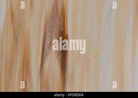 Abstract beige and brown fluid acrylic paint texture with smooth gradient lines and subtle details Stock Photo