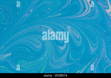 Full frame abstract blue and turquoise fluid paint texture. Marbling background with fine swirls Stock Photo