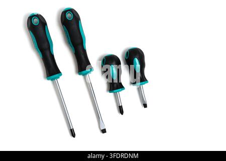 Set four manual screwdrivers different sizes isolated on clean white studio background Stock Photo