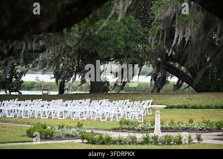 Outdoor Wedding Ceremony Setup Beneath Live Oak Trees in South Carolina, USA Stock Photo