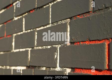 Plastered brick wall texture with red masonry gaps Stock Photo