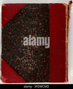 A bound book with a dark textured central panel and red leather corners and spine, by Fernand Lochard, a French photographer, in 1883-1884, as part of a set reproducing works by Édouard Manet. Stock Photo