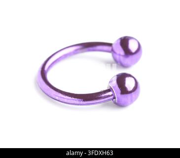 Body piercing and fashion accessories, purple circular barbell jewelry for ear or septum piercing isolated on a clean white background Stock Photo