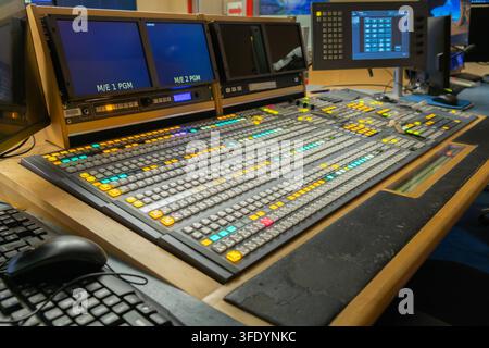 Ljubljana, Slovenia June 28, 2026 professional broadcast control console in a television studio control room used for live production and video switch Stock Photo