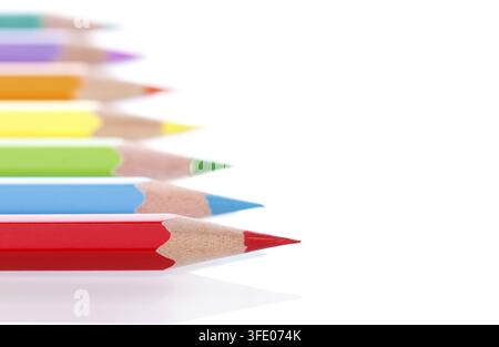 Colorful pencils isolated over white background close up macro Stock Photo