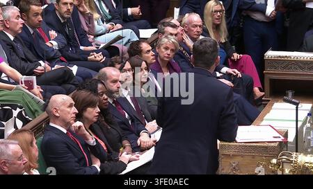 Screen grab of Prime Minister Andy Burnham looking towards members of the cabinet (left to right) Chancellor of the Exchequer John Healey, Education Secretary Lucy Powell, Energy Secretary Miatta Fahbulleh, Business Secretary Jonathan Reynolds, Justice Secretary Alex Norris, Minister for Women and Equalities Bridget Phillipson, Foreign Office minister Hamish Falconer, Health Secretary Yvette Cooper, Housing minister Matthew Pennycook, Northern Ireland Secretary Sir Chris Bryant and Work and Pensions Secretary Pat McFadden, as he speaks during his first Prime Minister's Questions in the House o Stock Photo