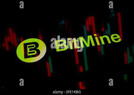 Paris, France - September 2, 2026 : BitMine logo displayed on a screen with stock market charts. Stock Photo