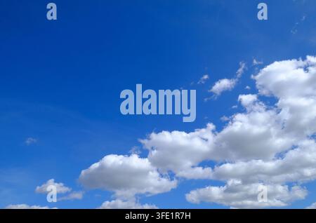 white clouds on bright blue sky background Stock Photo
