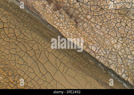 Aerial view of the cracked earth patterns and dry mud textures of Gora Bokty in Karakiya District, Mangystau Region, Kazakhstan. Stock Photo