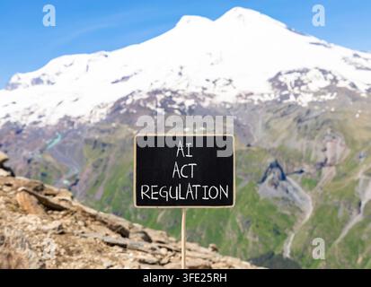 AI act regulation words symbol. Concept words AI artificial intelligence act regulation on beautiful black blackboard. Beautiful mountain background. Stock Photo