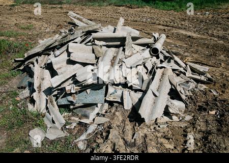 Heap of broken asbestos slate Stock Photo