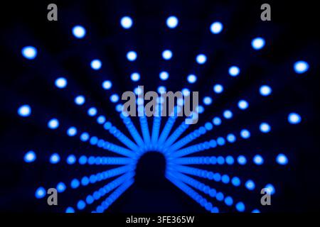 Blue neon lights in tunnel Stock Photo