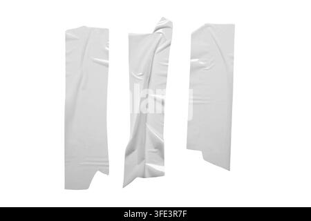 Three stripes of adhesive tape isolated on white background, closeup Stock Photo