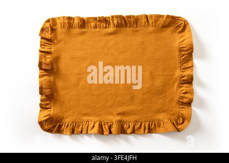 Rectangular mustard cooking linen kitchen towel with ruffle edges isolated on white background. Top view. Stock Photo