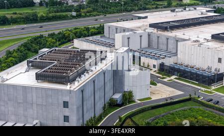 Large data center facility with multiple buildings and cooling units in Virginia. Stock Photo