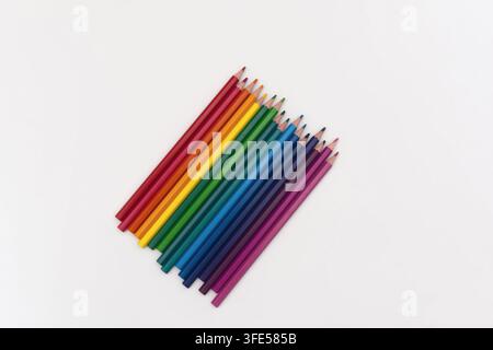 Colored Pencils Arranged in Diagonal Line Isolated Stock Photo