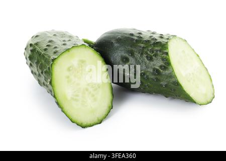 Halves of fresh ripe cucumber isolated on white Stock Photo