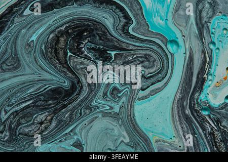 Abstract fluid painting featuring turquoise blue dark swirl details and liquid marble texture background Stock Photo