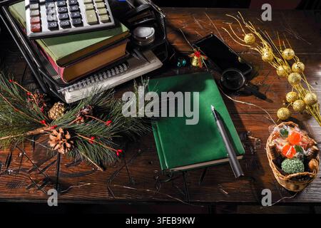 New Year planning with a notebook beside Christmas decorations Stock ...