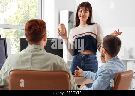Team of young programmers working in office Stock Photo