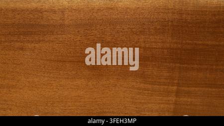 African walnut wood showing natural brown grain Stock Photo