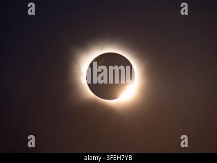 Spectacular Total Solar Eclipse and Glowing Solar Corona Stock Photo