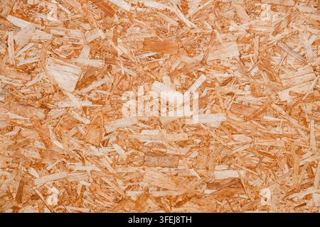 chipboard background, wooden plywood close-up Stock Photo