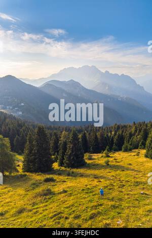 The panoramic view over Presolana massif in summer from Croce del Vareno. Angolo Terme, Valcamonica, Brescia district, Lombardy, Italy. Stock Photo