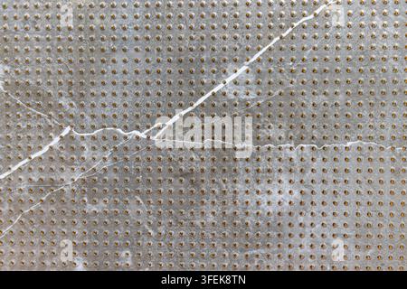 Textured grey stone tile surface with white veins Stock Photo