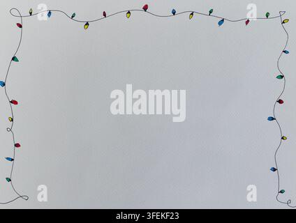 Hand drawn string lights border with colorful bulbs framing corners on lightly textured white paper  Stock Photo