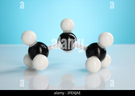 Chemical model of molecule on white table against light blue background, closeup Stock Photo