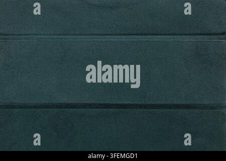 Dark green suede surface with a soft pile. Emerald textured background with horizontal lines Stock Photo