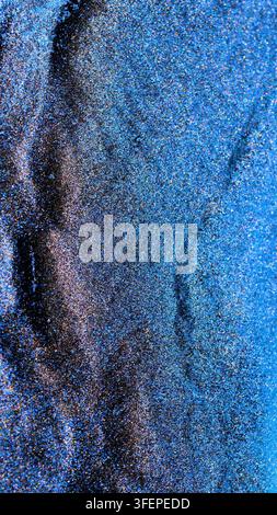 Mixing alcohol ink creates colorful patterns on a surface Stock Photo
