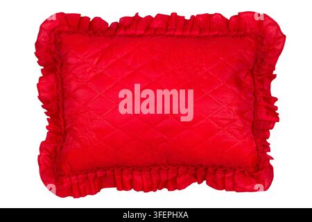 Red pillow on white background. Decorative red pillow isolated on white background. Stock Photo