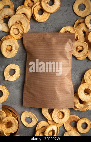 Kraft paper bag mockup with dried apple rings Stock Photo