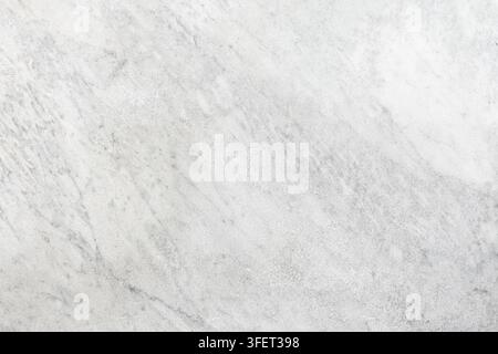 White marble surface displaying natural patterns and texture Stock Photo