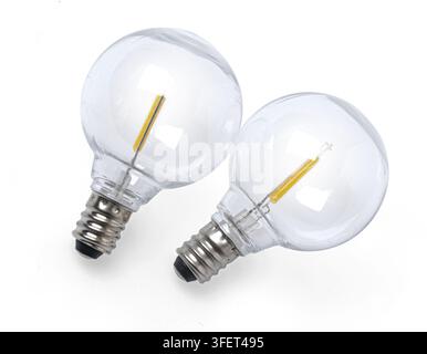 Clear led bulbs featuring yellow filaments on a white background Stock Photo