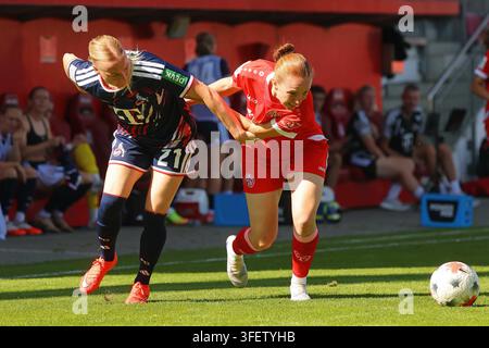 From left: Leonie Stöhr (Mainz, 31), Marie Steiner (TSG, 9), duel, game ...