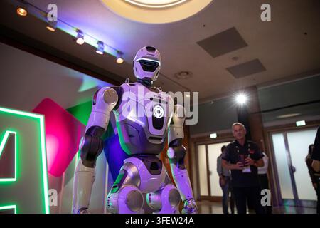 Berlin, Berlin, Germany. 5th Sep, 2026. Humanoid robots, quadrupeds and AI-powered companion machines perform during Robots on the Runway at IFA 2026 at Messe Berlin in Berlin, Germany, on Saturday, September 5, 2026. The live technology showcase turned the traditional fashion-show format over to robots, with machines walking the catwalk, dancing, posing, performing tricks and demonstrating advances in movement, sensor technology and human-machine interaction. Eleven robotics companies took part in the show, bringing together humanoid, four-legged, transformable and companion robots as art Stock Photo