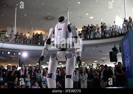 Humanoid robots, quadrupeds and AI-powered companion machines perform during Robots on the Runway at IFA 2026 at Messe Berlin in Berlin, Germany, on Saturday, September 5, 2026. The live technology showcase turned the traditional fashion-show format over to robots, with machines walking the catwalk, dancing, posing, performing tricks and demonstrating advances in movement, sensor technology and human-machine interaction. Eleven robotics companies took part in the show, bringing together humanoid, four-legged, transformable and companion robots as artificial intelligence and so-called embodied Stock Photo