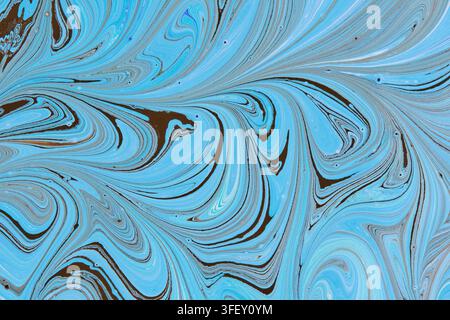 Ebru art marble texture with rich dark brown and sky blue liquid paint swirls creating bold pattern Stock Photo