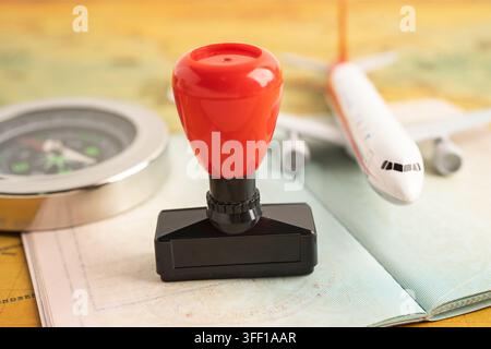 Approved Stamp visa and passport document to immigration at airport in country. Stock Photo