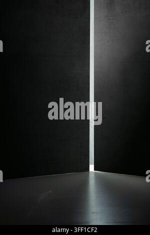 A conceptual abstract image showing a bright vertical beam of light shining through a narrow crack between two dark textured walls, symbolizing hope, Stock Photo