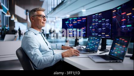 Software Engineer Rapidly Builds Business Applications Using Low-code Platform And Laptop. Stock Photo